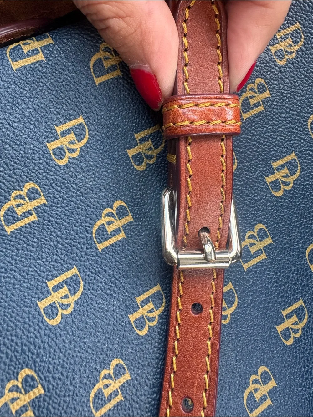 Dooney & Bourke navy with Brown Trim Monogram Crossbody